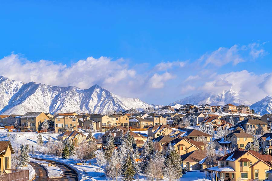 Insurance Quote - Scenic View of a Residential Neighborhood Surrounded by Snowy Mountains in the City of Highland Utah